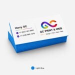 stack of 32pt painted edge business cards showing thickness and color layers